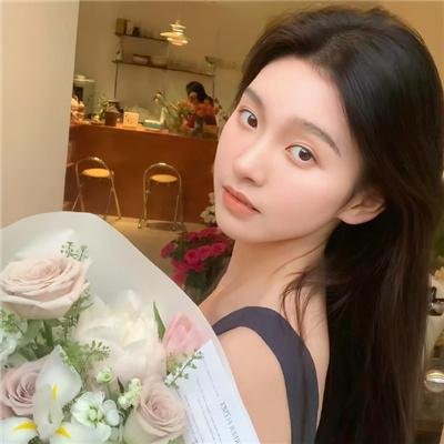 桃花含露又春风